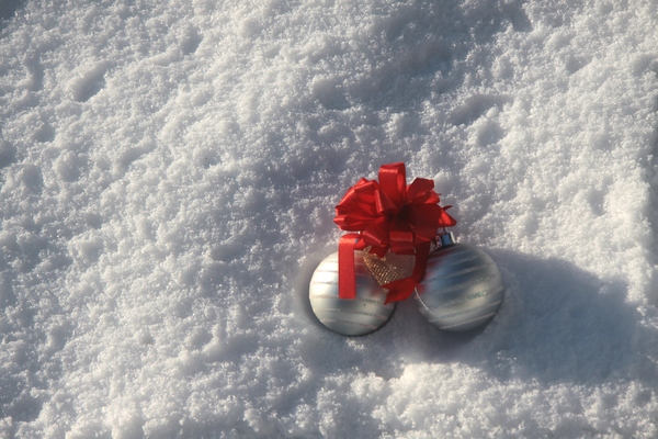 Christmas baubles in the snow