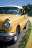 Yellow Cuban classic car 2