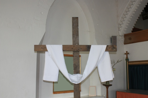 Cross draped, in a church