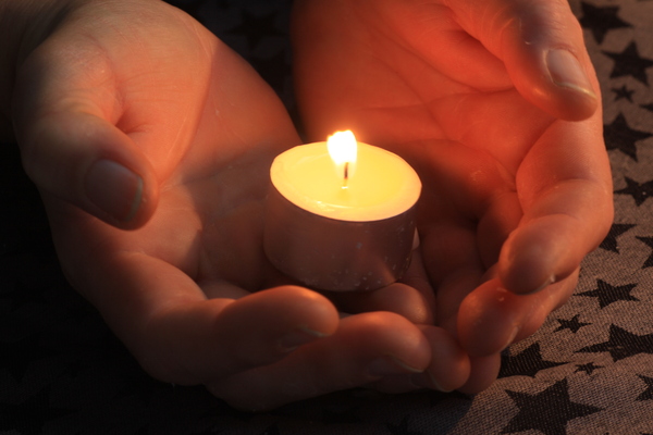 Here's a light: Offering  light and heartiness in figure of a candle