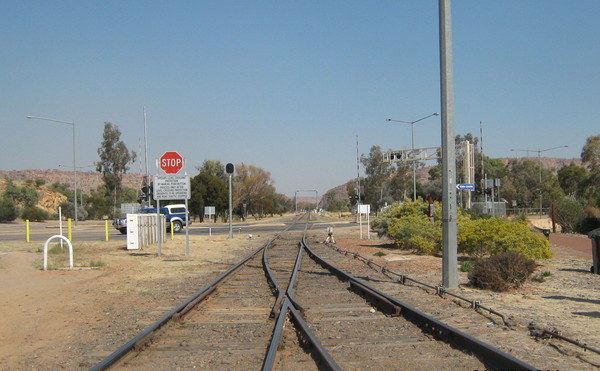 South from Alice springs: Rail line leaving Alice Springs Station, Central Australia, heading South toward Heavitree Gap and on toward Adelaide, South Australia.