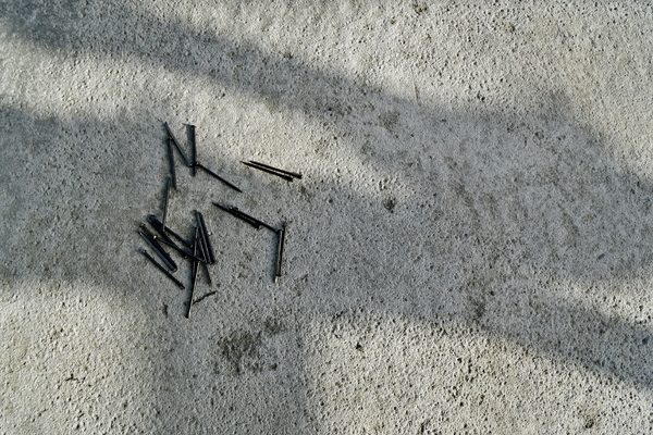steel nails on concrete slab