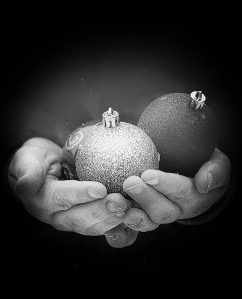 baubles in hands grainy: black and white baubles in hands, grainy iso for a bit of drama :)