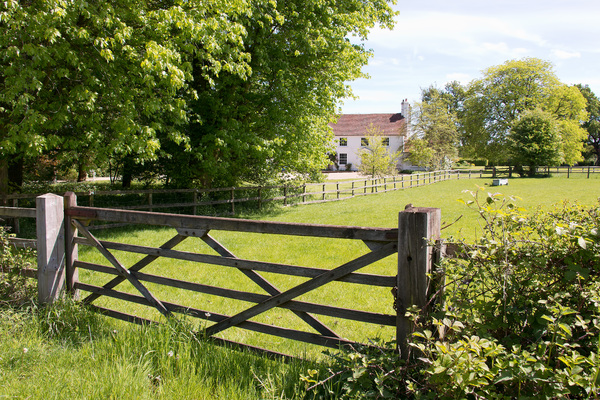 Rural gate and house