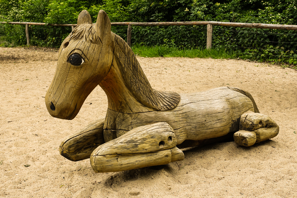kneeling wooden horse
