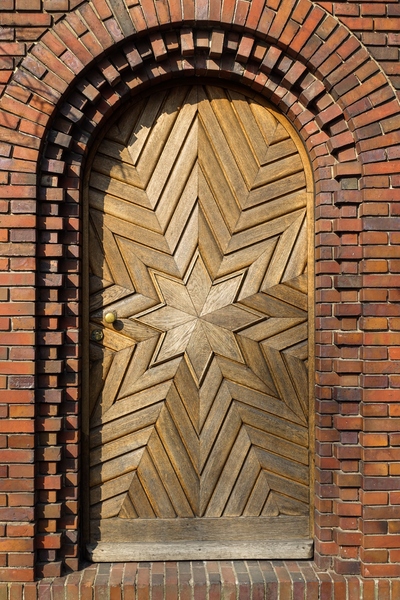 wooden door with a star