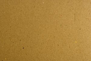 Thin Cardboard Texture: A detailed shot of some brown cardboard. For use a a fill layer or a texture.