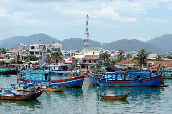 boats: Fishing boats in a harbor in Nha Trang, Vietnam.