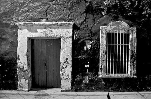 Door and window B&W: Black & white shot of an old door and window and textured wall