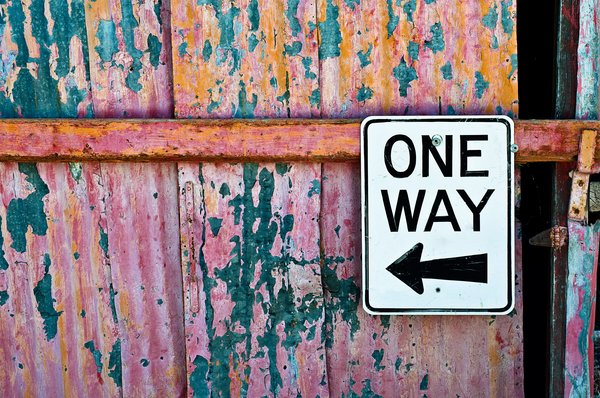 One Way: One Way sign on a rickety old shack in Jerome, Arizona.