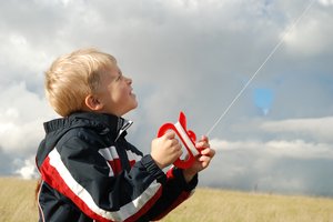 Kite Boy 5: Six years old boy flying a kite.