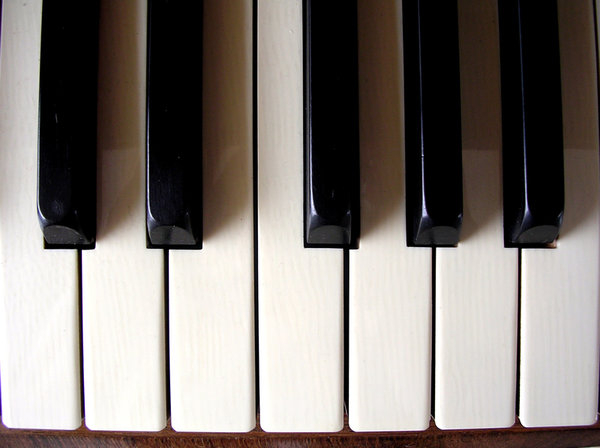 Piano Keys: Close up of a Piano's keys.This is a smaller version of the original which was uploaded to SXC about a year ago and had been downloaded 1130 times. The original has been moved to http://www.bigstockphoto. ..and can be bought for commercial use. The smalle