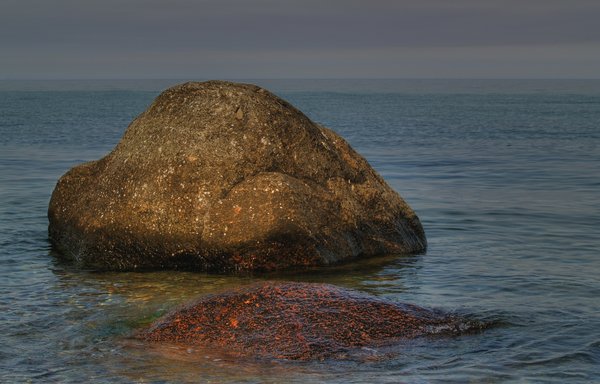 big stone in water