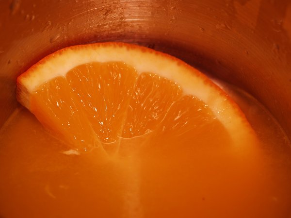 Orange: Orange and hand pressing orange for the sake of the juice