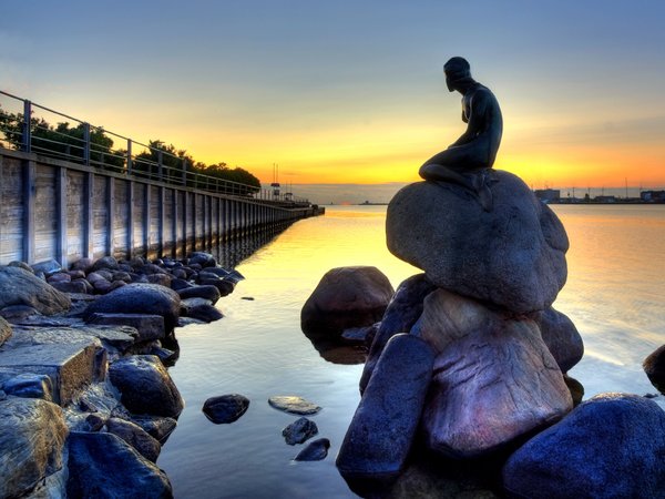 Mermaid - HDR: The original Mermaid sitting in Copenhagen Harbour, Denmark. She is looking out of the harbour - into the sunrise. The picture is HDR using seven images