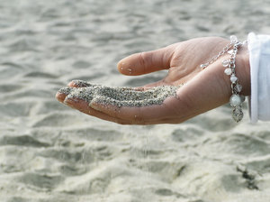 Areia na mão