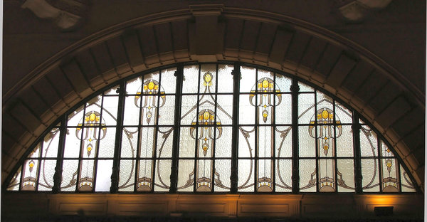underneath the arches: arched stained glass windows