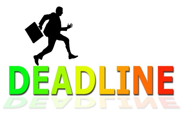 Deadline: Business man running across the word Deadline