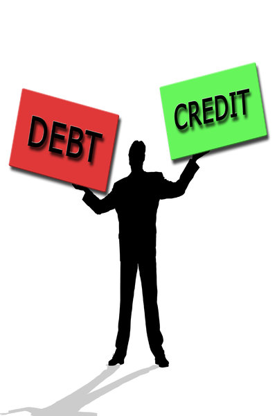 Debt & Credit: Debt and credit concept male juggling two boxes