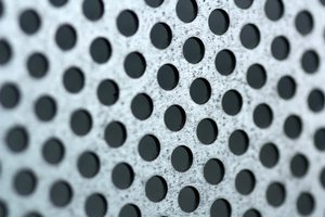 Mesh Holes Close-up: Steel mesh holes shot at close range.