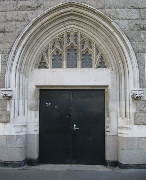modern door in old portal