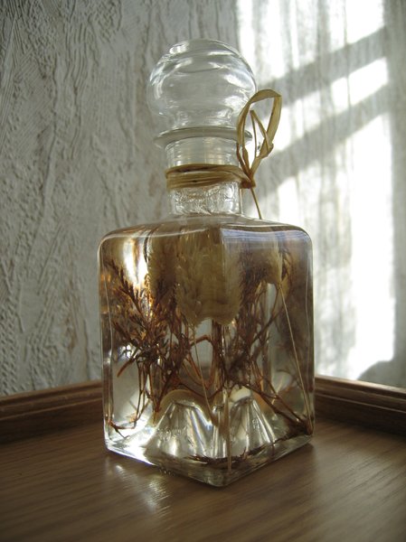 dried flowers in a bottle