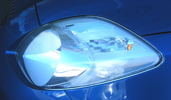 headlight: clean and polished car headlight - background