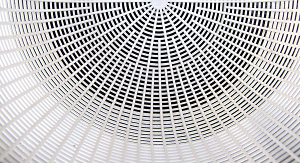 plastic patterns: the lines and patterns of a white plastic basket
