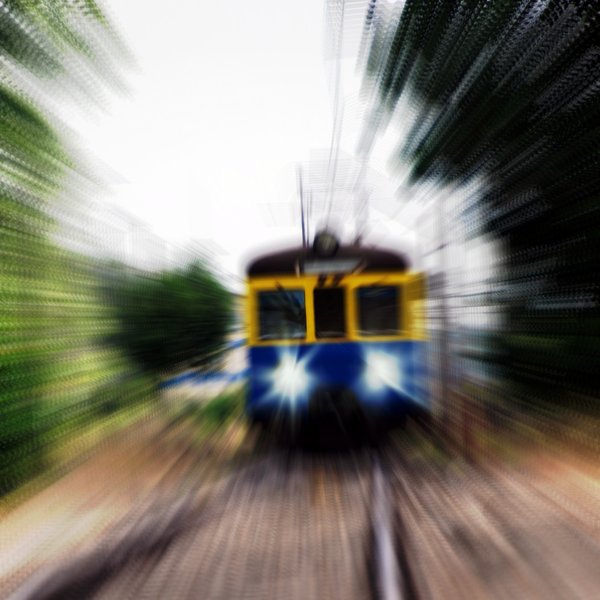 Fast train: Zooming effect and city train in Poland