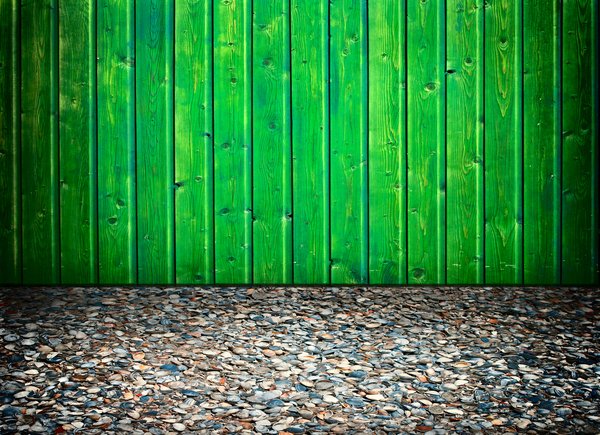 Cerca verde con piso de shell: 
