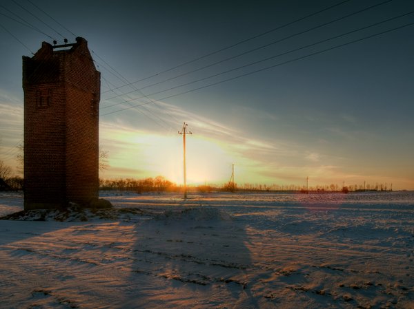 Transformerstation - HDR: A transformer station in a snowy, rural scenery.
