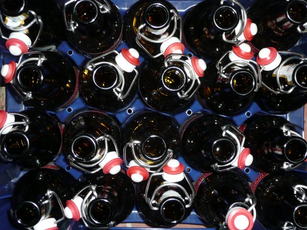 Bottles: Empty beer bottles in a crate