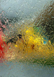 water textures: abstract colour and shape images seen through water running down glass windows
