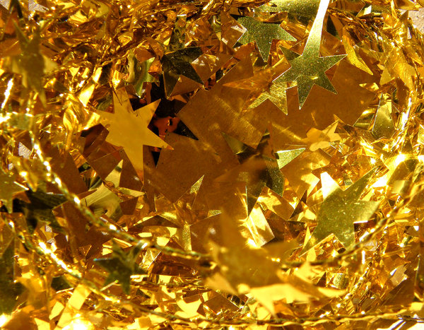 Christmas colours: golden star-shaped Christmas tinsel