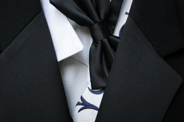 Tuxedo and Tie: Close-up of formal evening wear with tuxedo and bow tie