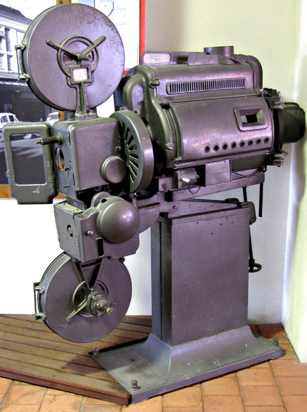 historic movie projector: old historic theatre movie projector