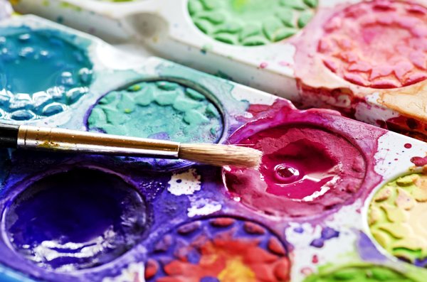 Paint colors: watercolor paint palette and brush