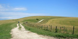 Cycling: Cross-country cyclists on a chalky ridge of the South Downs, West Sussex, England, in early July.