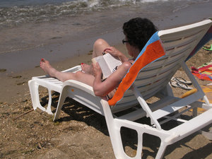 reading and sunbathing