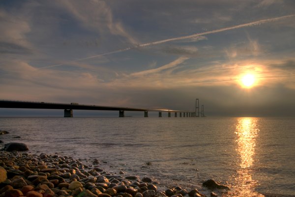 Bridge and Sky - HDR: Great Belt Bridge in Denmark chossing Great Baelt in sunset. The images is HDR