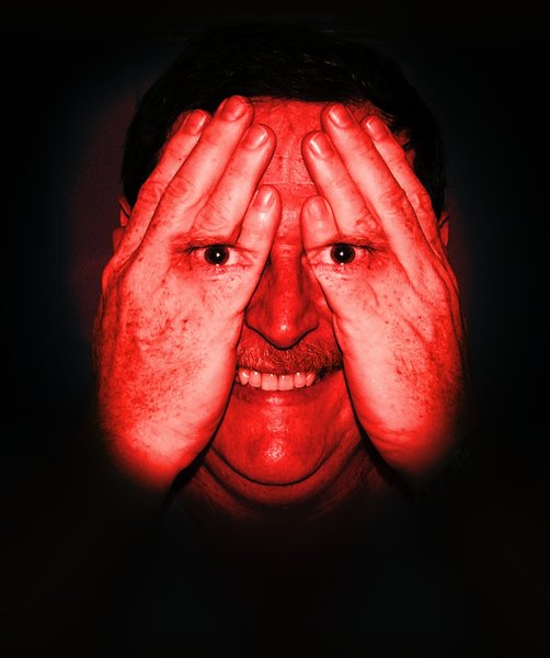 I can still see you...3: A spooky image of a man hiding his face, but his eyes are visible through his hands. Has a scary smile and a strange expression in his eyes. Blood red effect. Could be a spy or the NSA. You may like:  http://www.rgbstock.com/photo/nbtJ04e/I+can+still+see+you...2