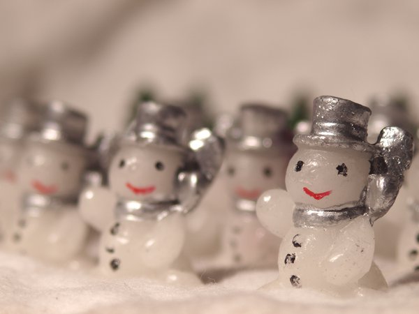 Happy snowmen in rows