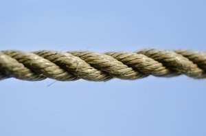 Rope in the sky: Piece of rope against blue sky