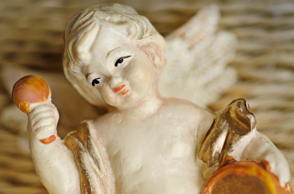 Christmas angel portrait: close up of a small christmas angel ornament