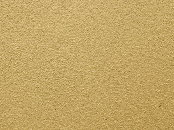 cream wall surface: cream coloured textured wall