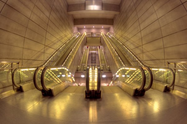 Escalators in Metro - HDR: Moving escalators in Copenhagen Metro. The image is HDR.