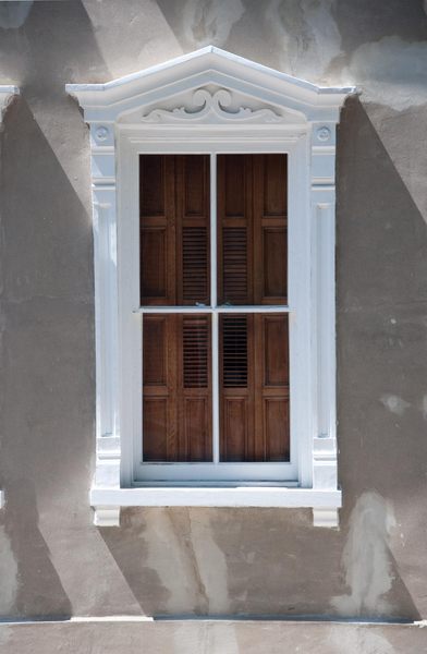 Classical windows: Windows without shutters, almost all late 18thC or early 19th, shot in direct sunlight or midday filtered sunlight. Charleston, South Carolina, USA