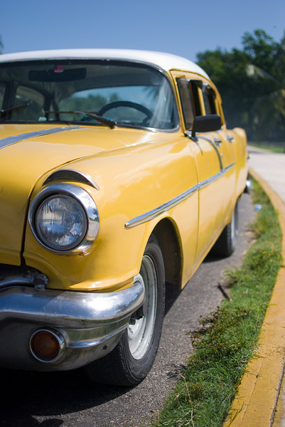 Yellow Cuban classic car 2