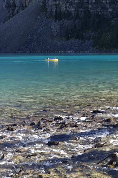 Canoe on blue lake