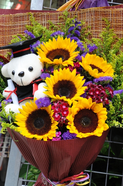 teddy bear and flowers